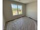 Bedroom with carpet, fresh paint, double-hung window with view, and electrical outlets at 33 W Emily Gardens Dr, Selma, NC 27576