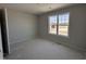 Unfinished bedroom with large window and natural light at 33 W Emily Gardens Dr, Selma, NC 27576