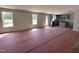 Spacious, light-filled open-concept living room and kitchen area with large windows at 33 W Emily Gardens Dr, Selma, NC 27576