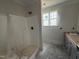 Clean bathroom featuring a modern shower stall and a stylish vanity at 40 Bailey-Boykin Rd, Selma, NC 27576