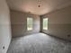 Bedroom with two windows for natural light at 40 Bailey-Boykin Rd, Selma, NC 27576