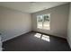 Light and airy bedroom with large window overlooking front yard at 40 Bailey-Boykin Rd, Selma, NC 27576