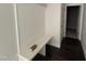 Functional entryway featuring custom bench seating, shiplap accent wall, and convenient closet access at 40 Bailey-Boykin Rd, Selma, NC 27576
