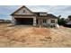 New home under construction with a two-car garage and covered porch at 40 Bailey-Boykin Rd, Selma, NC 27576