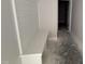 Hallway featuring a built-in bench with a modern, functional design and access to other rooms at 40 Bailey-Boykin Rd, Selma, NC 27576