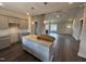 Open concept kitchen with a center island, granite countertops, and modern grey cabinetry at 40 Bailey-Boykin Rd, Selma, NC 27576