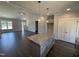 Eat-in kitchen featuring granite countertops, stainless appliances, and pendant lighting at 40 Bailey-Boykin Rd, Selma, NC 27576