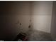 Unfinished laundry room with white walls and concrete floor, ready for customization at 40 Bailey-Boykin Rd, Selma, NC 27576