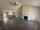 Bright living room features high ceilings, a modern fireplace, and seamless flow to the kitchen at 40 Bailey-Boykin Rd, Selma, NC 27576