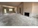 Spacious living room with fireplace and large windows for natural light at 40 Bailey-Boykin Rd, Selma, NC 27576