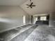 Open-concept living space with high ceilings and seamlessly connected kitchen area for modern living and entertaining at 40 Bailey-Boykin Rd, Selma, NC 27576