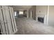 Spacious living area with fireplace and ample natural light, perfect for entertaining at 40 Bailey-Boykin Rd, Selma, NC 27576