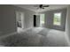 Spacious main bedroom with an ensuite bathroom, filled with natural light from the large windows at 40 Bailey-Boykin Rd, Selma, NC 27576