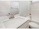 Bathroom with a gray vanity, white countertop, and a white framed mirror at 40 Tuskeegee Dr, Smithfield, NC 27577