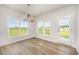 Cozy dining area with abundant natural light and access to outdoor space at 40 Tuskeegee Dr, Smithfield, NC 27577