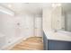 Bathroom with walk-in shower, vanity, and sink at 41 W Emily Gardens Dr, Selma, NC 27576