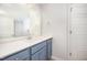 Bathroom with vanity, sink, and large mirror at 41 W Emily Gardens Dr, Selma, NC 27576