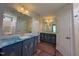 A spacious bathroom featuring a double vanity with new countertops and modern fixtures at 41 W Emily Gardens Dr, Selma, NC 27576