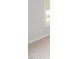 Well-lit bedroom with neutral walls and carpet at 41 W Emily Gardens Dr, Selma, NC 27576