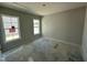 Bright bedroom featuring natural light from two windows and neutral-colored walls at 41 W Emily Gardens Dr, Selma, NC 27576