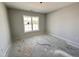 Bright bedroom featuring a large window providing natural light, perfect for a serene and relaxing space at 41 W Emily Gardens Dr, Selma, NC 27576