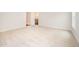 Bedroom with carpet and an adjacent bathroom down the hall at 41 W Emily Gardens Dr, Selma, NC 27576