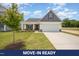 Charming single-Gathering home with a two-car garage, well-manicured lawn, and beautiful landscaping at 41 W Emily Gardens Dr, Selma, NC 27576