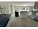 Spacious kitchen with an island and modern appliances, ready for culinary adventures and entertaining guests at 41 W Emily Gardens Dr, Selma, NC 27576