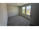 Bedroom with new carpet, neutral paint and lots of natural light from the windows at 43 Chloe Ct, Selma, NC 27576