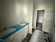 Bathroom with double vanity, and white cabinets at 43 Chloe Ct, Selma, NC 27577