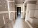 Unfinished bathroom area featuring newly installed drywall, a shower stall, and doorway at 43 Chloe Ct, Selma, NC 27577