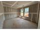 Unfinished bedroom featuring two windows bringing in lots of natural light at 43 Chloe Ct, Selma, NC 27577
