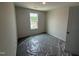 Bright bedroom features a window providing natural light and neutral wall color to match any decor at 43 Chloe Ct, Selma, NC 27577