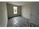 Bright bedroom with neutral walls, carpeted floors covered in plastic and a window view at 43 Chloe Ct, Selma, NC 27577