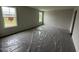 Bright bedroom featuring carpet, and large windows at 43 Chloe Ct, Selma, NC 27577