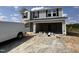Two story home featuring siding, black window shutters and an attached two car garage at 43 Chloe Ct, Selma, NC 27577