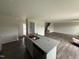 Bright kitchen features hardwood floors, granite countertops, and a stainless sink at 43 Chloe Ct, Selma, NC 27577