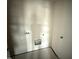Small laundry room with connections, light, and door at 43 Chloe Ct, Selma, NC 27577