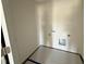 Laundry room with washer and dryer hookups and laminate flooring at 43 Chloe Ct, Selma, NC 27577