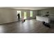 Open living room features hardwood floors, granite countertops, and stainless sink at 43 Chloe Ct, Selma, NC 27577