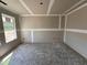 Unfinished room featuring newly installed drywall and trim and a single window providing natural light at 43 Chloe Ct, Selma, NC 27577
