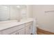 Bathroom featuring modern vanity with white countertop, ample mirror, and modern hardware at 46 Lupin Dr, Smithfield, NC 27577
