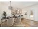 Dining area and view of kitchen with barstool seating at 46 Lupin Dr, Smithfield, NC 27577