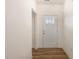 Bright entryway with hardwood floors and white trim at 46 Lupin Dr, Smithfield, NC 27577