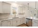 Bright kitchen features granite countertops, stainless steel dishwasher, and subway tile backsplash at 46 Lupin Dr, Smithfield, NC 27577
