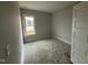 Cozy bedroom with natural light streaming through the window, awaiting your personal design at 47 Royal Ave, Selma, NC 27576