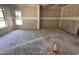 Bright living room showing the new construction with a large window at 47 Royal Ave, Selma, NC 27576