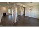 Spacious living room featuring hardwood floors, fireplace, recessed lighting, and decorative wainscoting at 47 Royal Ave, Selma, NC 27576
