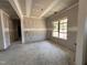 Bright room featuring new construction and large window at 47 Royal Ave, Selma, NC 27576