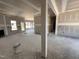 Spacious living room with fireplace and natural light streaming through large windows, under construction at 47 Royal Ave, Selma, NC 27576